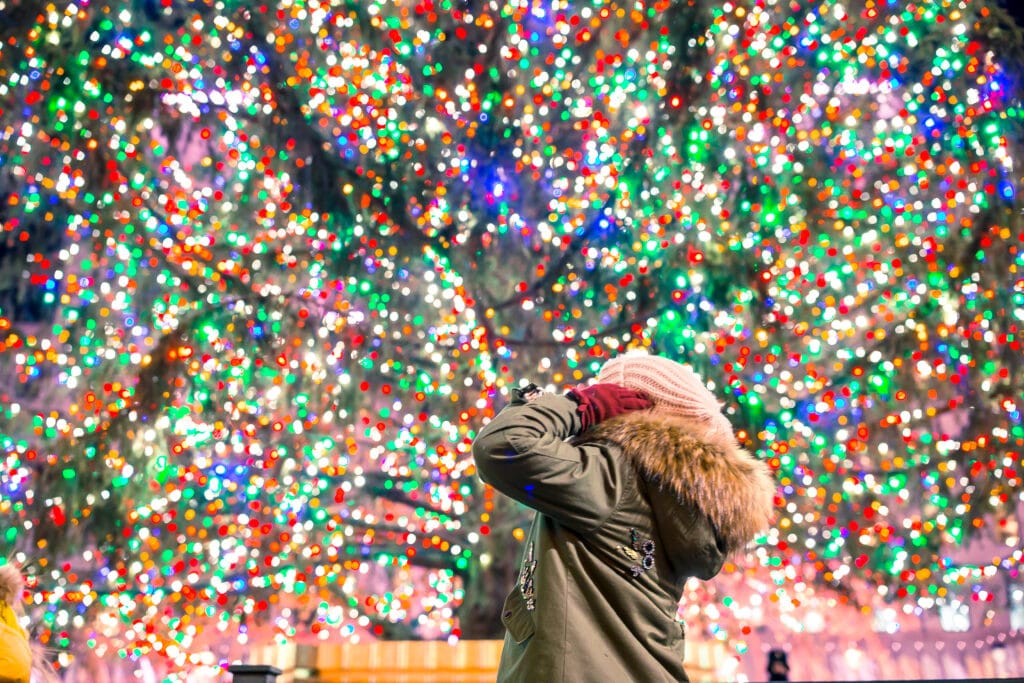 happy girl on the background of the rockefeller ch 2023 11 27 05 27 42 utc History and Architecture of Rockefeller Center